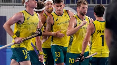 The Aussies celebrate Blake Goversâ€™ goal.