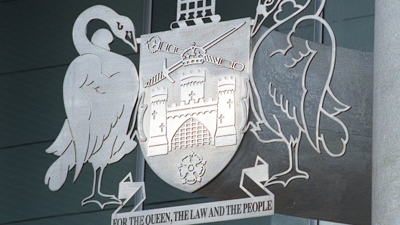 The coat of arms of the City of Canberra, at the ACT Magistrates Court.