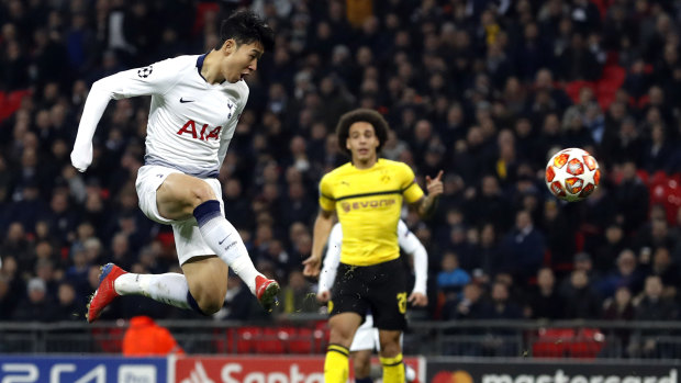 Tottenham's Son Heung-min scores the opening goal of the Champions League clash with Borussia Dortmund.