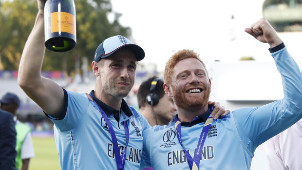 Chris Woakes (left) and Jonny Bairstow celebrating their World Cup triumph.