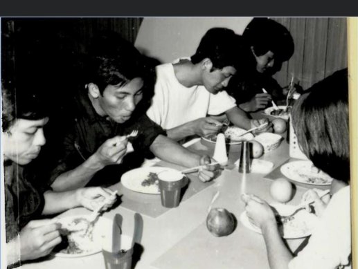 Stephen Nguyen (far left) at the first light meal on board HMAS Melbourne.