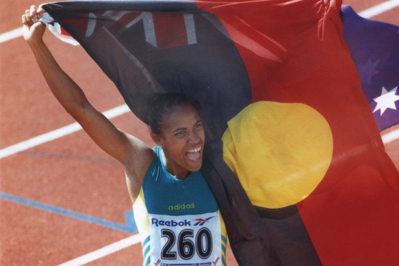 It was Peter Jess who handed Cathy Freeman the flag for this iconic Commonwealth Games moment in 1994.