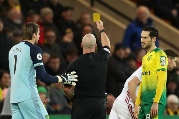 A FIFA health expert has called for spitting during games to be punished with a yellow card.