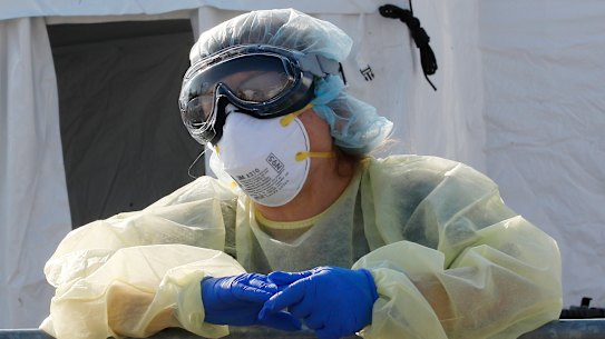 A staffer of the Samaritan's Purse field hospital that is being set up in Cremona, Italy.