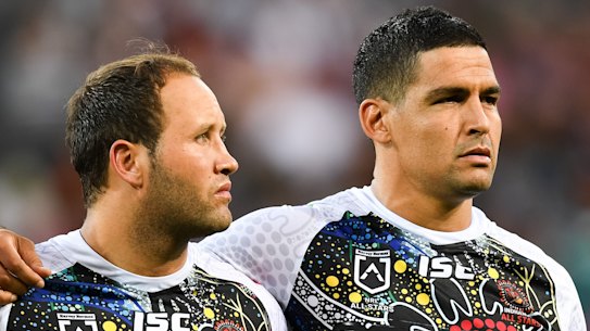 Taking a stand: Cody Walker, right,  opted not to sing the anthem before the NRL Allstars match.