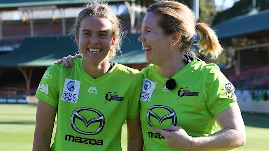 Teenager Phoebe Litchfield (left) was told she by Alex Blackwell she had been picked to play in Cricket Australia's bushfire appeal game.