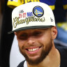 Andre Iguodala, Draymond Green, Klay Thompson and Stephen Curry  of the Golden State Warriors after claiming the NBA championship for a  fourth time.