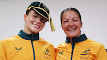 Jemma Bemrose of Australia is presented with her debut cap by Michaela Leonard.
