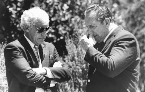 Illegal gaming boss George Freeman (left) and Lennie McPherson at the funeral of crime boss “Paddles” Anderson in Waverley, Sydney, in January 1985.