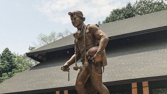 A statue of Saman Gunan, the former Thai Navy Seal who died during the rescue of the Wild Boars soccer team