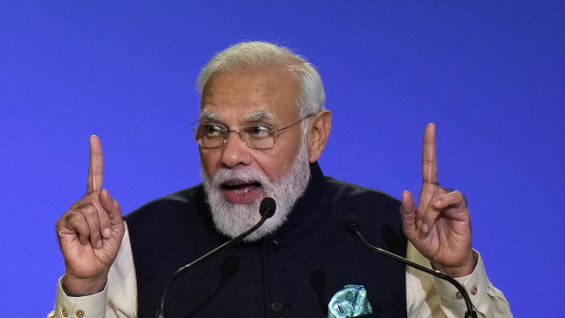 Indian Prime Minister Narendra Modi presents his national statement on day two of COP26.