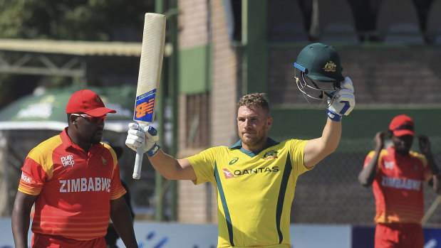 But wait, there's more: Aaron Finch celebrates a century against Zimbabwe.