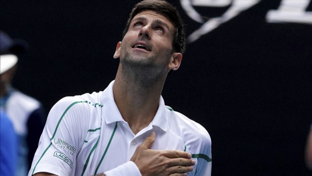 Divine inspiration: Serbia's Novak Djokovic reacts after progressing to the Australian Open quarter-finals.