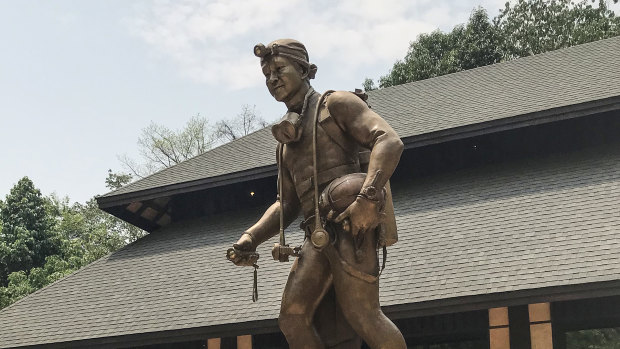 A statue of Saman Gunan, the former Thai Navy Seal who died during the rescue of the Wild Boars soccer team