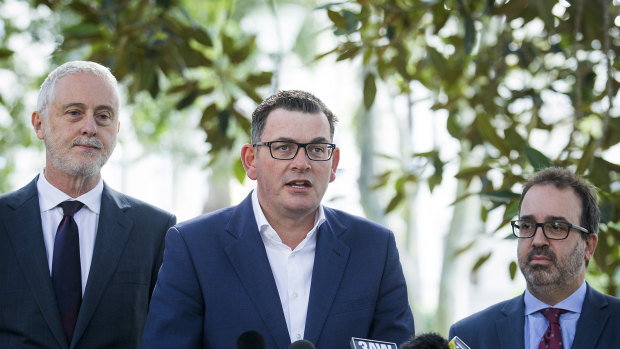 Premier Daniel Andrews flanked by Gavin Jennings and Martin Pakula.