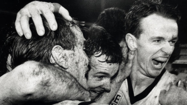 Full time ... Brothers Anthony and Terry Daniher join Barry Mitchell to celebrate NSW's win at the SCG last night.