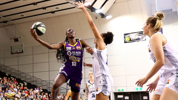 Easy does it: Melbourne Boomers' Ezi Magbegor racks up more points against the Lightning.