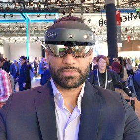 HoloLens 2 is comfortable to wear. You just slip it on like a baseball cap.