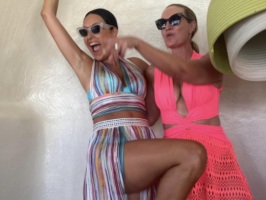 Terry Biviano (left) flying the Sydney flag with Sacha Calligeros in Greece last year while cruising with Bell.