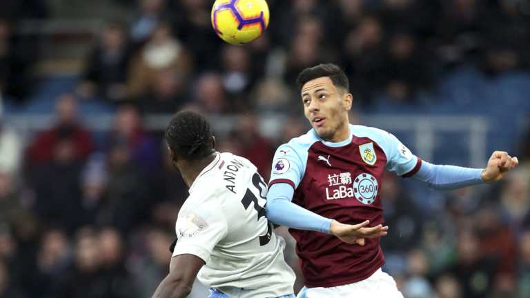 West Ham's Michail Antonio and Burnley's Dwight McNeil challenge for the ball at Turf Moor.