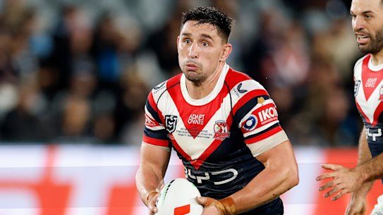 Victor Radley on the attack for the Roosters.