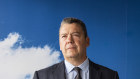 Grant Fenn has a plan to shrink Downer into a less risky business. 