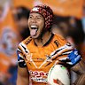Jarome Luai celebrates one of his three second-half tries on Sunday.