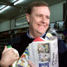 Peter Costello buys groceries on the first day of the GST ion July 1, 2000. The GST marks the last far-reaching reform of the nation’s tax system.