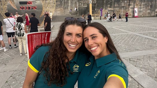 Jess and Noemie Fox in front of the Eiffel Twoer after Noemie qualified for her first Olympic Games.