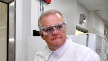 Prime Minister Scott Morrison at the University of Queensland. Medical research has been front and centre throughout the COVID-19 pandemic. 