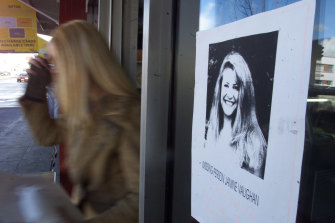 A missing person sign for Janine Vaughan in the window of a sandwich shop in Bathurst.