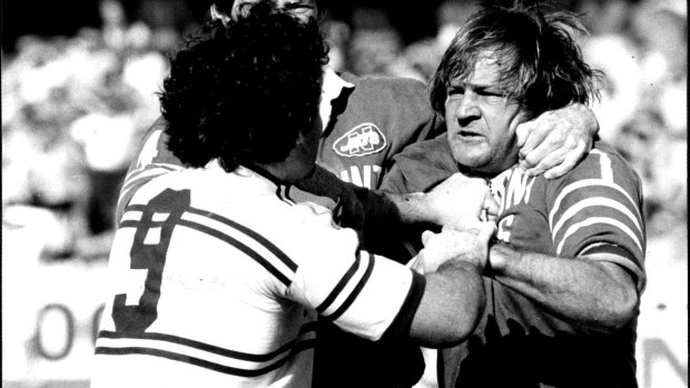 Raudonikis squares up to Manly's Les Boyd in the infamous semi-final battle at Henson Park in 1981.