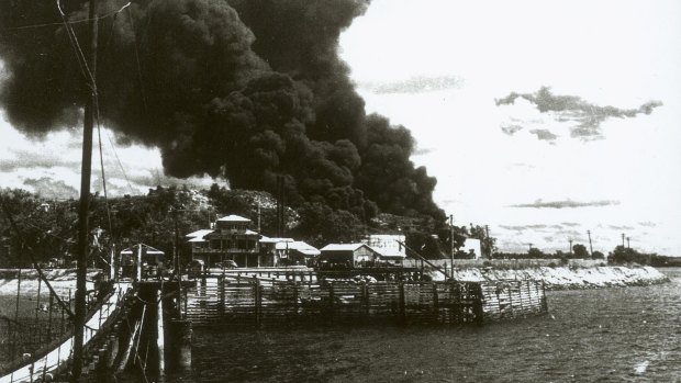 Burning oil tanks following Japanese raid on Darwin, 1942