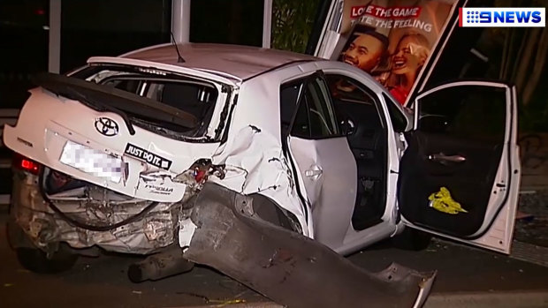 The white Toyota that had stopped at a red light in Annerley. Police said it was hit by the stolen car.