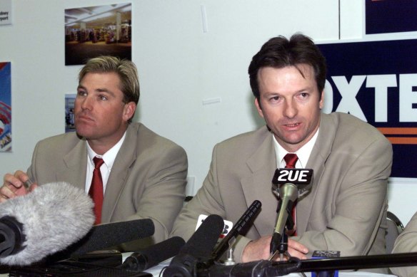 Frosty: Steve Waugh, right, and Shane Warne, left, at a press conference in 1999. 