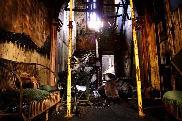 Charred remains of the hostel staircase.