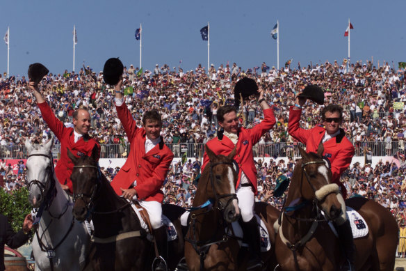 Australian teammates Andrew Hoy, Phillip Dutton, Matt Ryan and Stuart Tinney celebrate team gold at the Sydney Olympics.