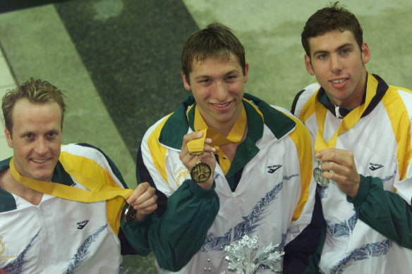 Ian Thorpe wins gold in the mens 400m freestyle with Australian teamates Grant Hackett (R) silver and Daniel Kowalski (L)  bronze.