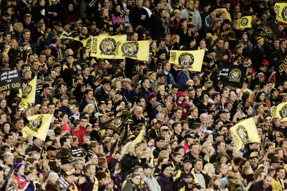 Daniel Andrews expects crowd limitations will be imposed when fans are eventually allowed back in stands. 