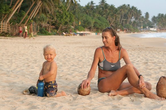 The author’s son, Finn, and wife Michelle on Mirissa beach.