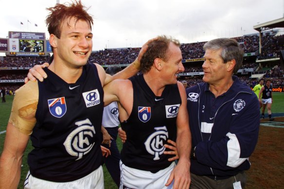 Aaron Hamill (left) celebrates the 1999 preliminary final win with Craig Bradley and David Parkin.