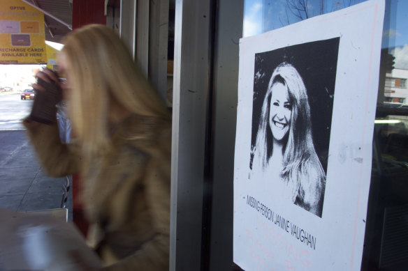 A missing person sign for Janine Vaughan in the window of a sandwich shop in Bathurst.