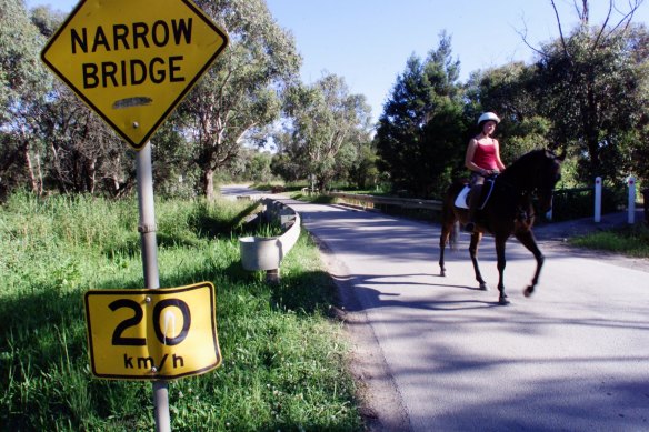 A horse and rider near a single-lane bridge in Cathies Lane, pictured in 2000.