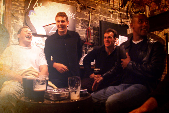 Phil Kearns, Jason Little, Nathan Grey and  George Gregan share a joke during their visit to the Guinness brewery.