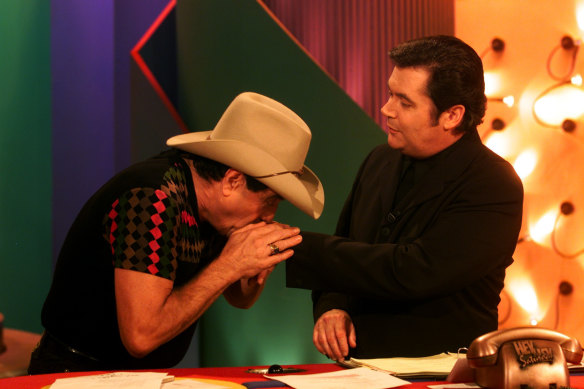 Molly Meldrum gives  Darryl a kiss on the hand during Hey Hey It's Saturday finale.