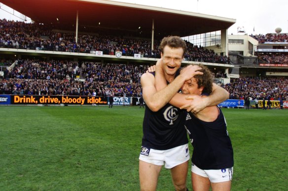 Carlton’s Matthew Allan and Fraser Brown celebrate after the win.