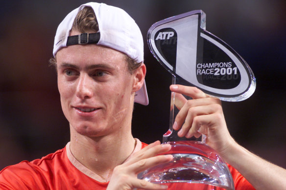 Lleyton Hewitt holding the No.1 trophy after beating Pat Rafter in the Masters Cup.