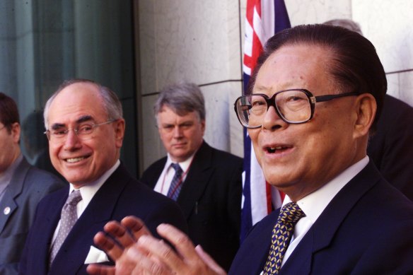 Former Chinese president Jiang Zemin, who has died aged 96, with former Australian prime minister John Howard.