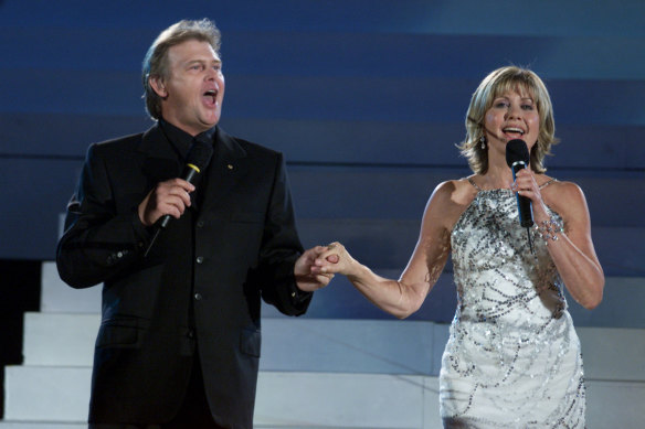 John Farnham and Olivia Newton-John at the opening ceremony of the 2000 Sydney Olympic Games.