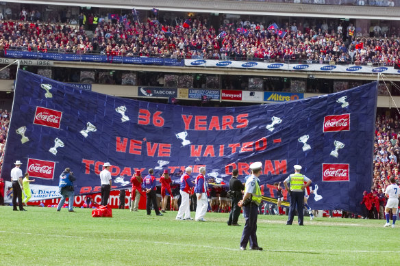 The Demons banner in the 2000 grand final.